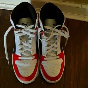 Puma High Tops size 10.5 U.S.black white and red.